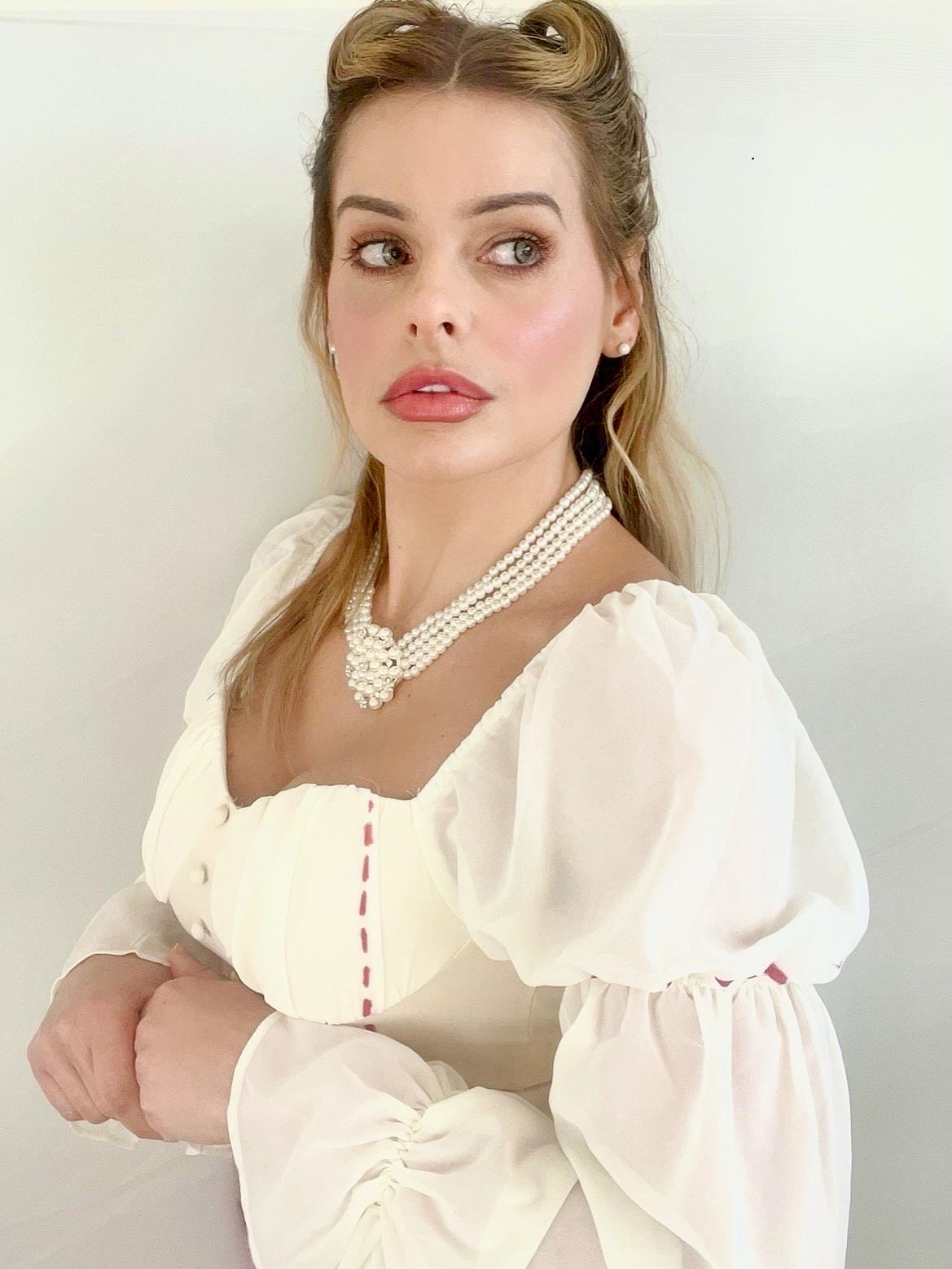 Margot Robbie: Biography, Career, Net Worth & Personal Life